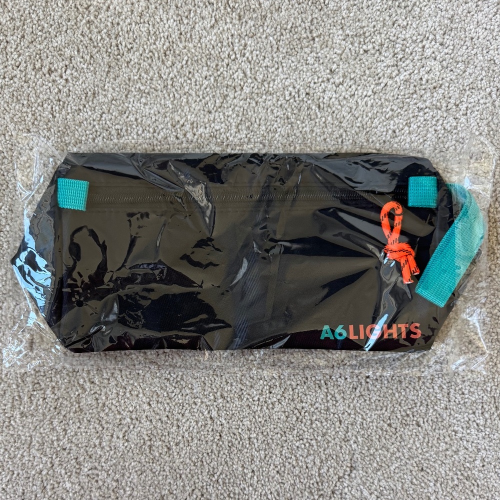 Lights A6 Exclusive VIP Merch Item Wristlet